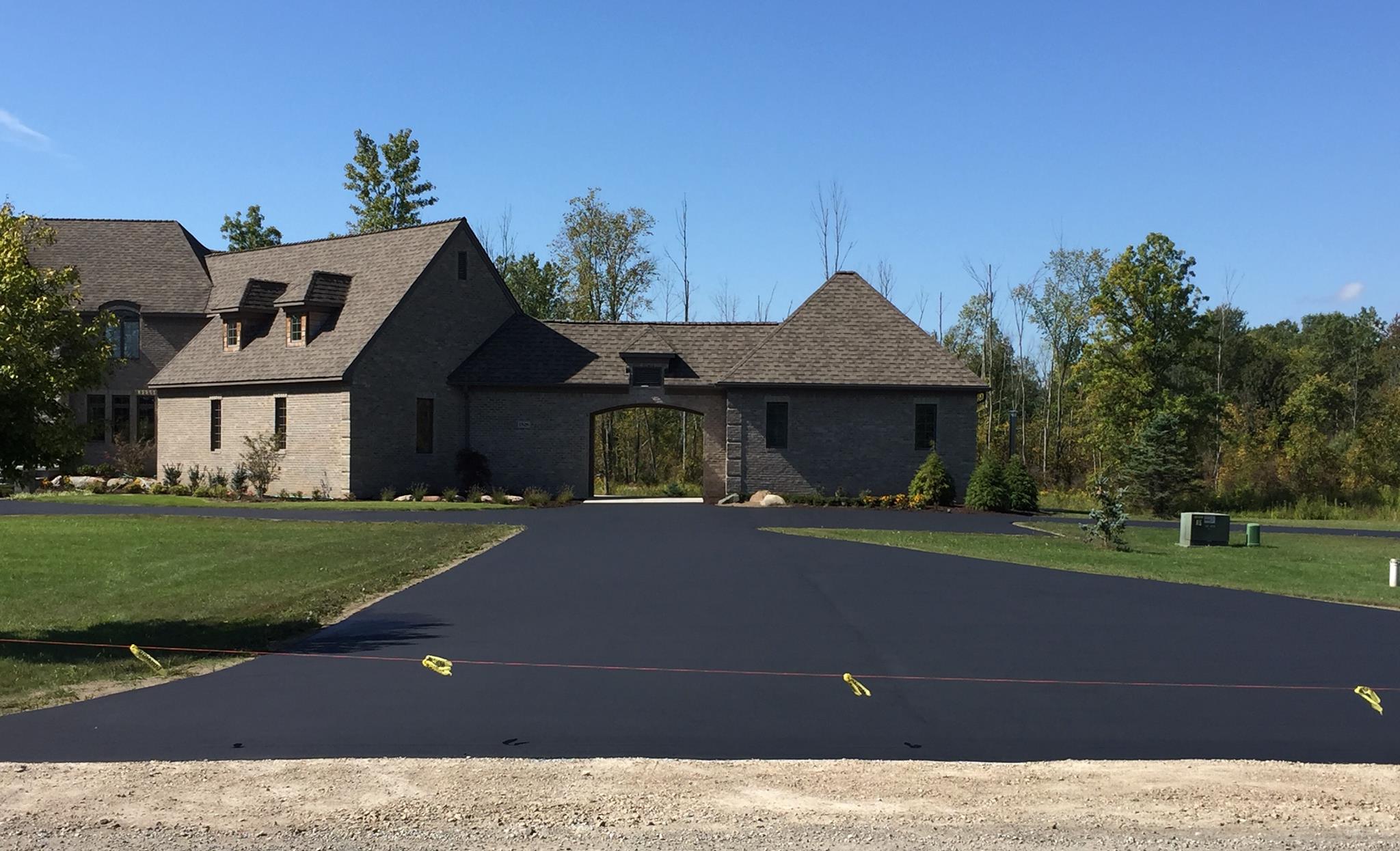 Residential driveway paving project by Total Asphalt Paving Inc.