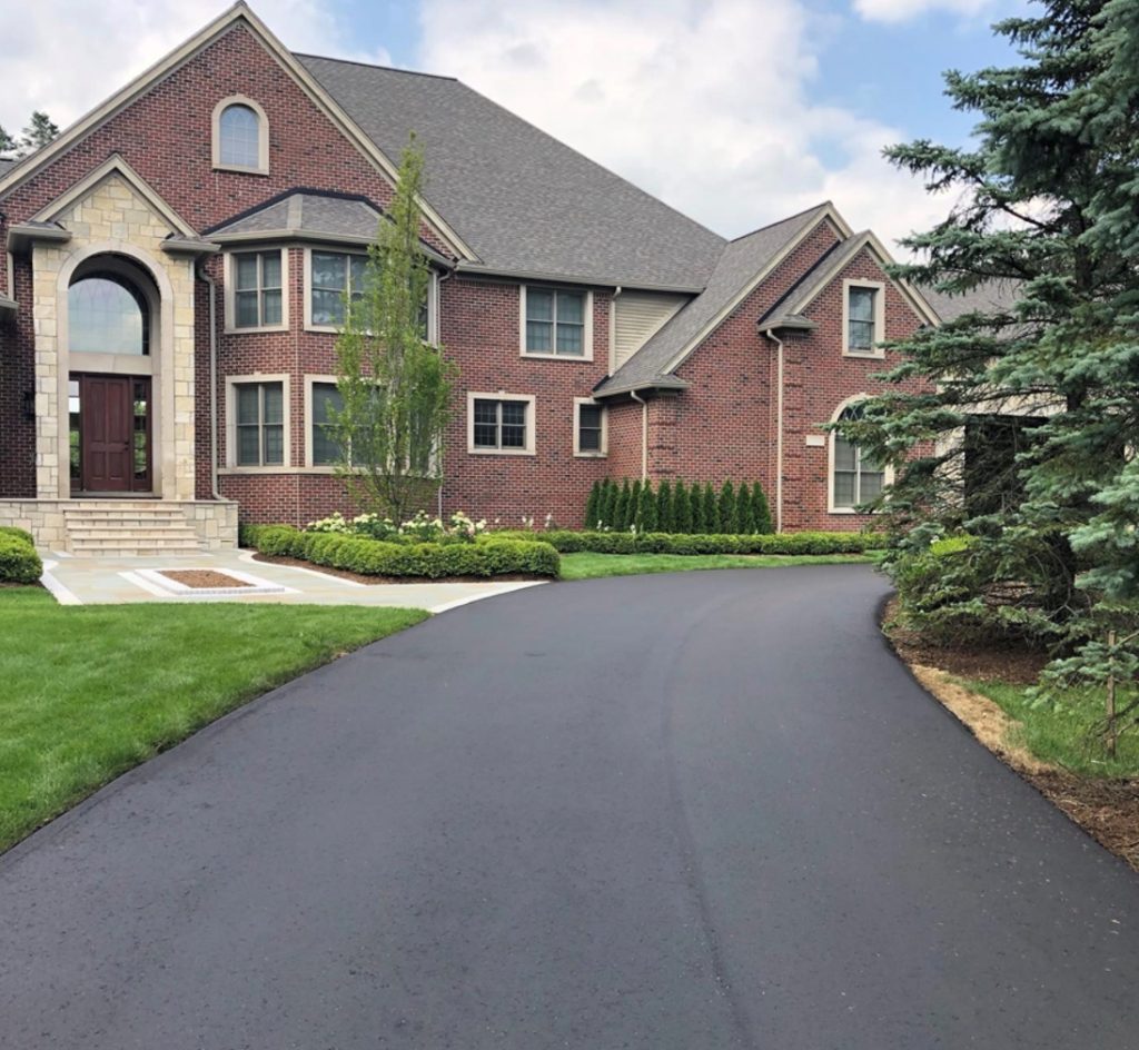 Driveway paved with asphalt by Total Asphalt Paving